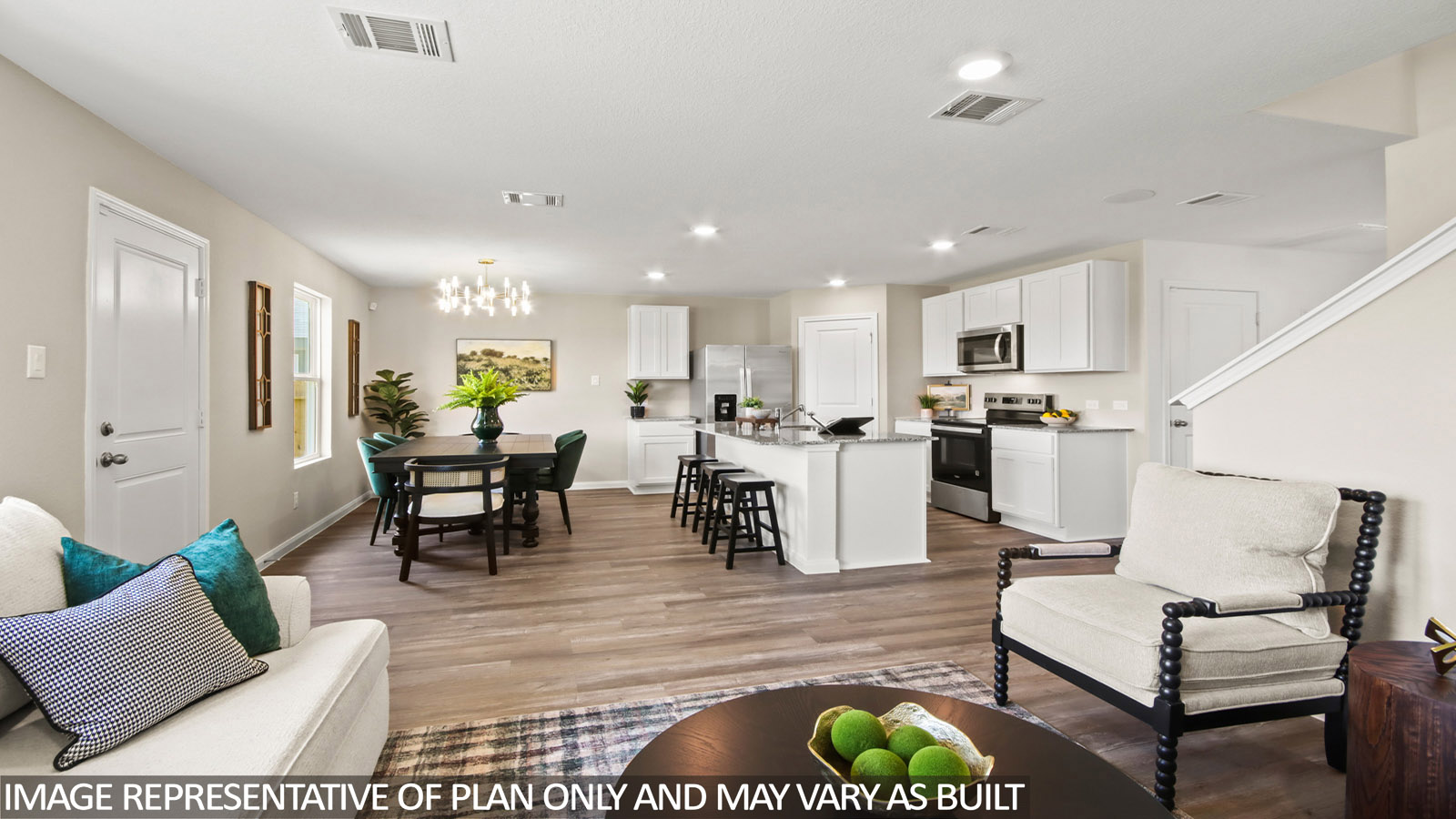 Open concept living, dining, and kitchen area