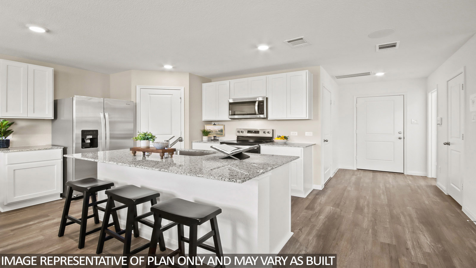 Open concept living, dining, and kitchen area