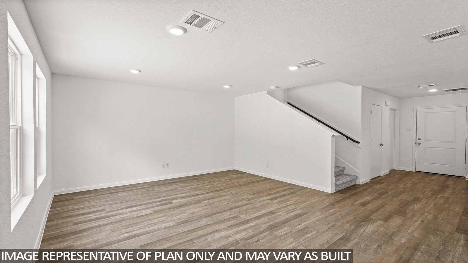 Open concept living, dining, and kitchen area