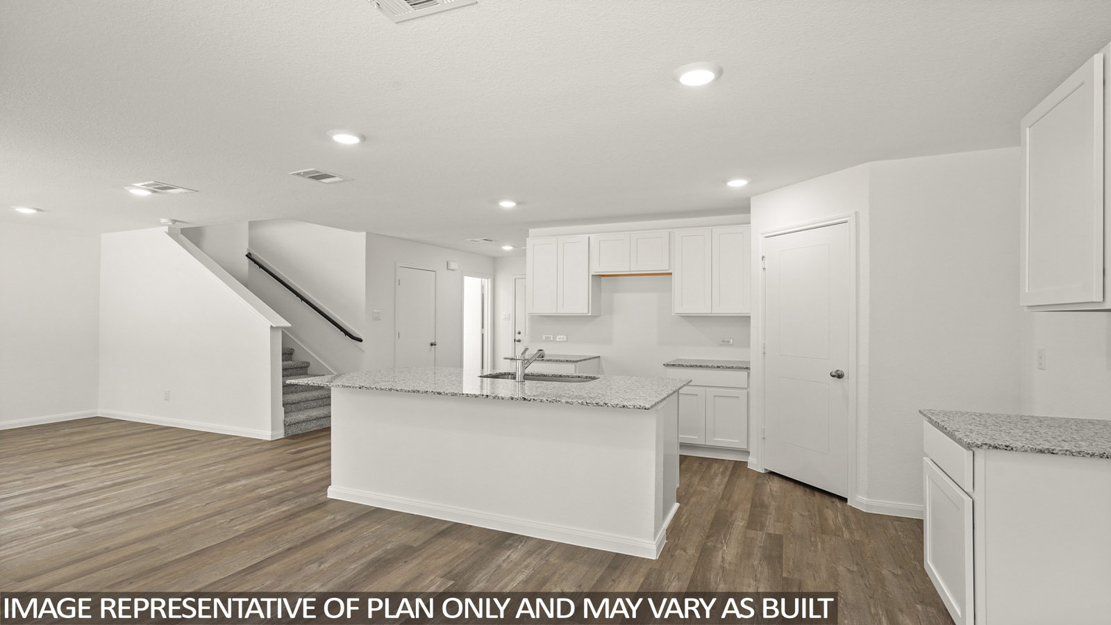 Open concept living, dining, and kitchen area