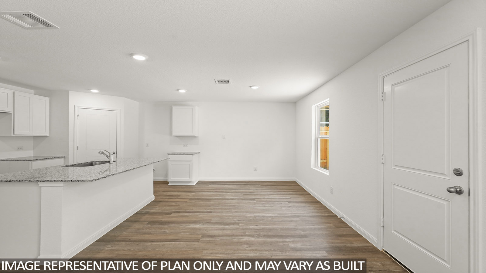 Open concept living, dining, and kitchen area