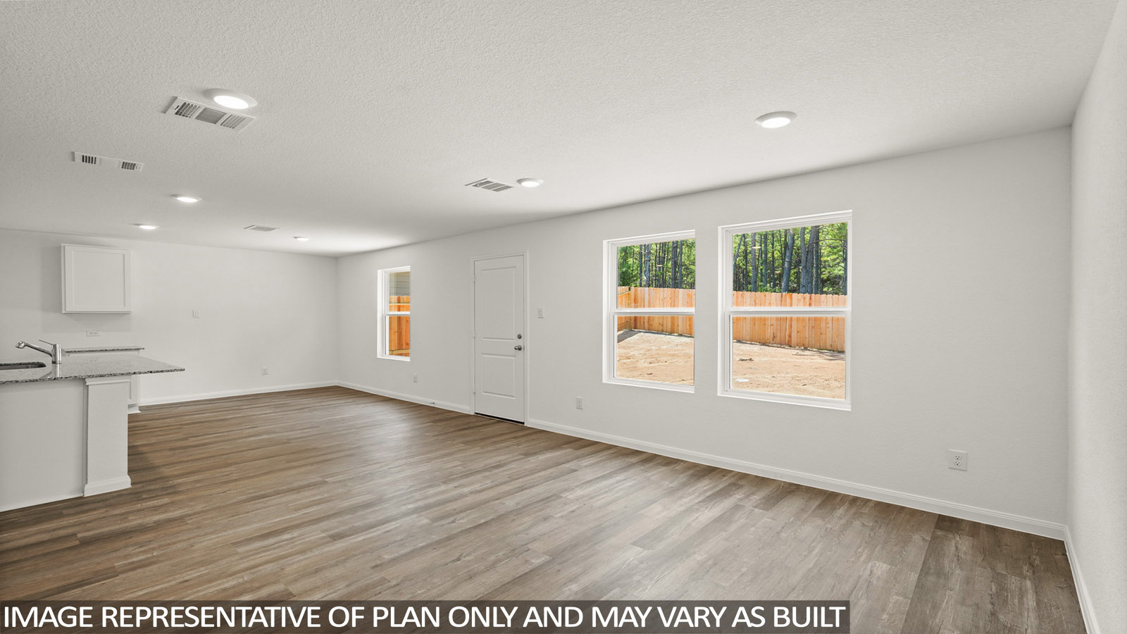 Open concept living, dining, and kitchen area