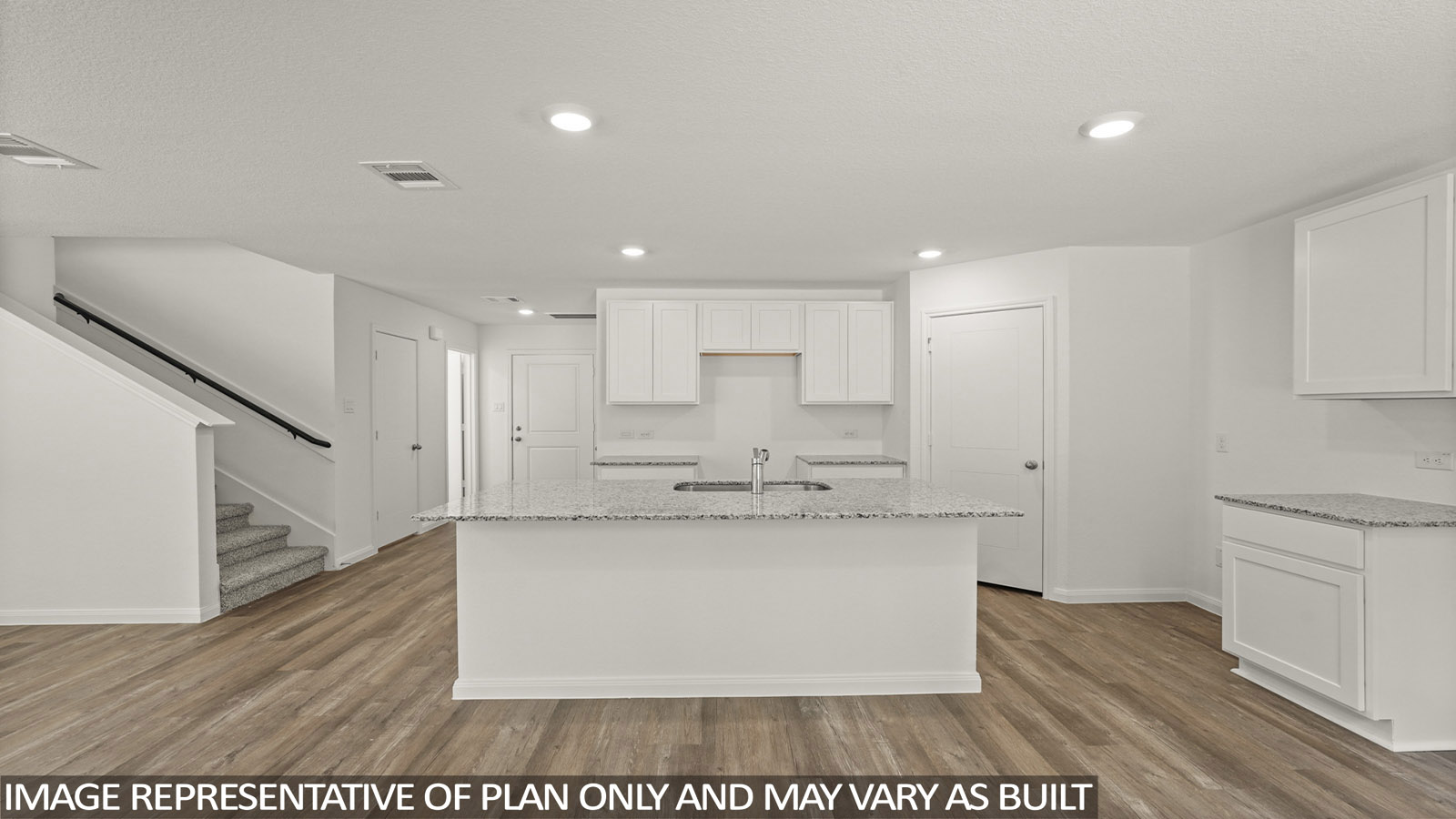 Open concept living, dining, and kitchen area
