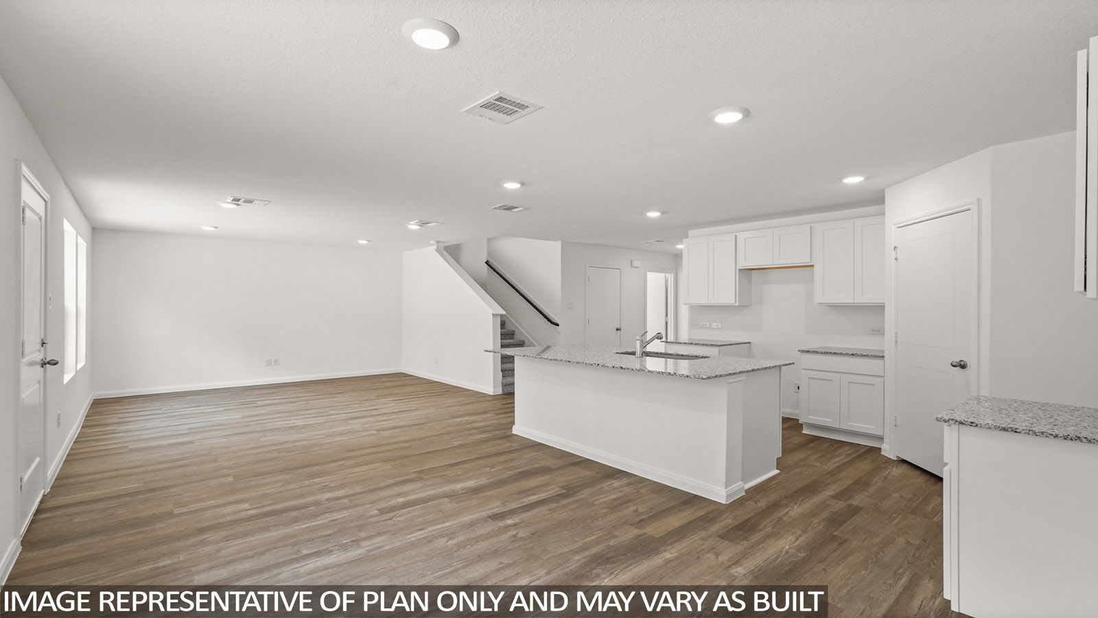 Open concept living, dining, and kitchen area