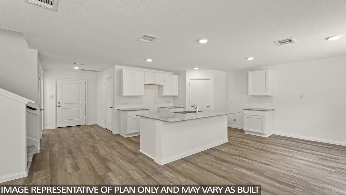 Open concept living, dining, and kitchen area