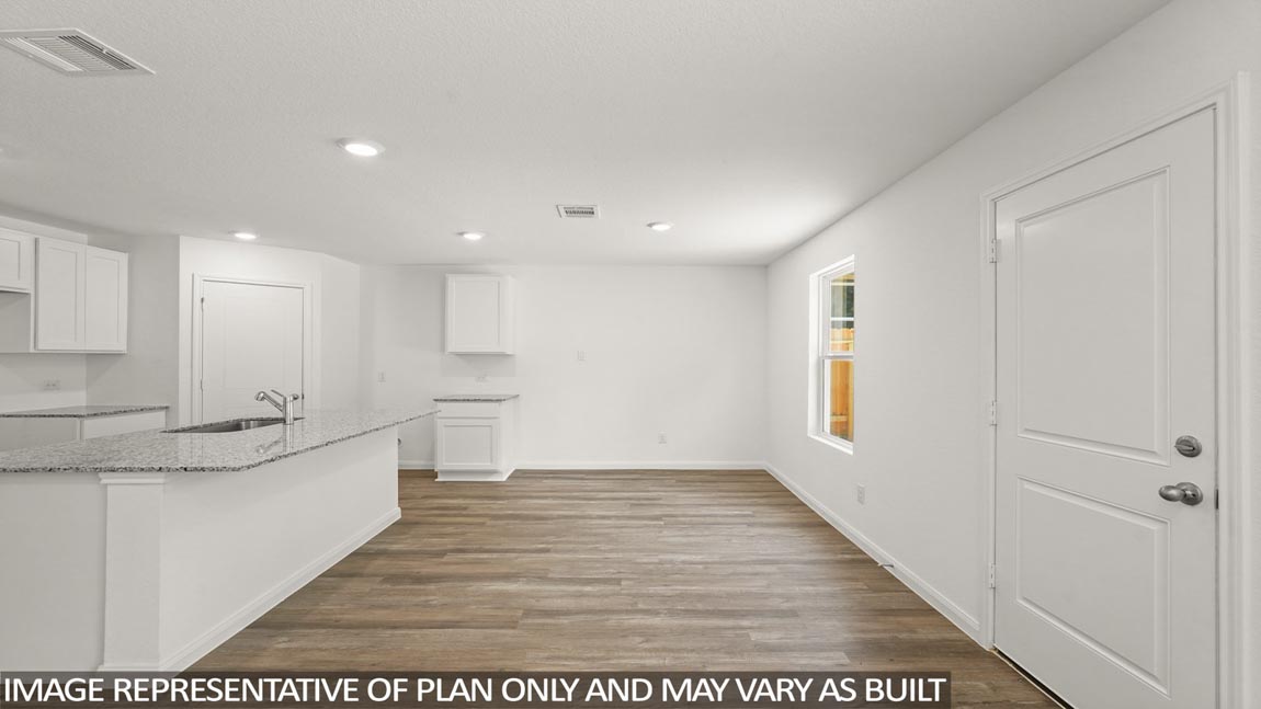 vvvOpen concept living, dining, and kitchen area