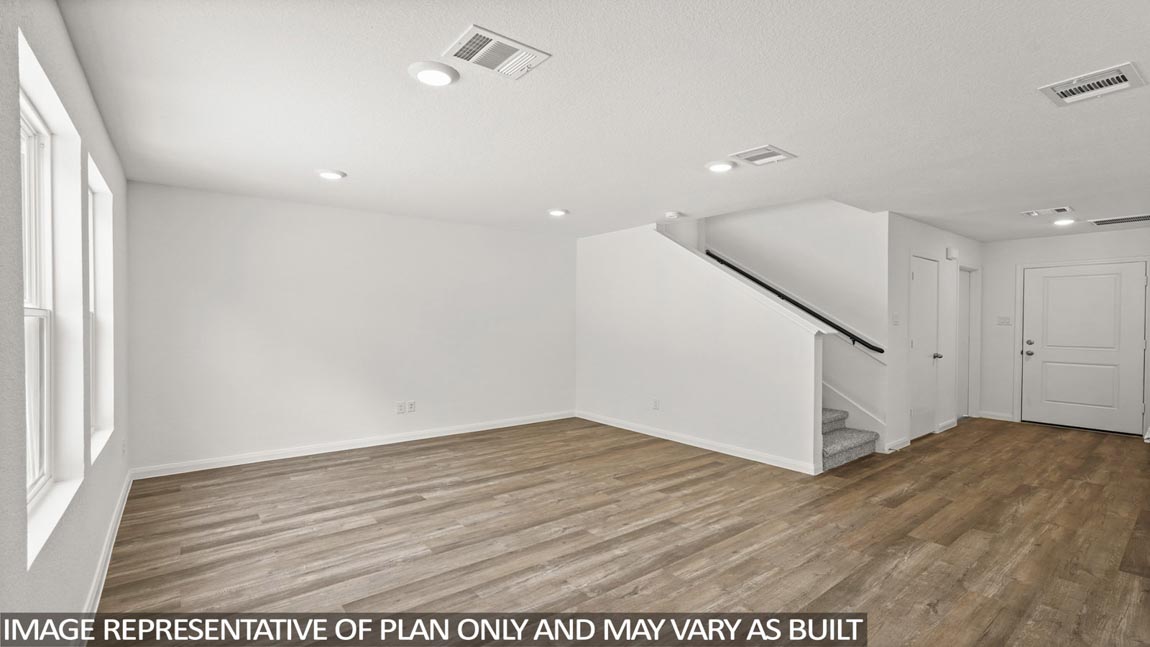 Open concept living, dining, and kitchen area