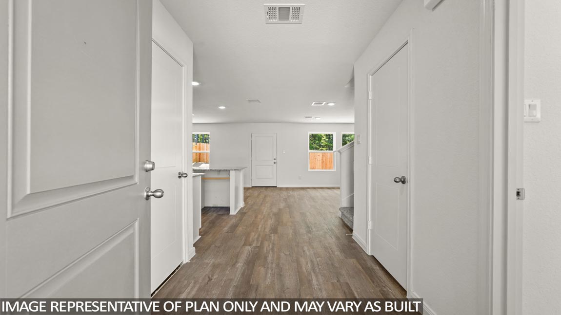 Entry hallway with vinyl flooring