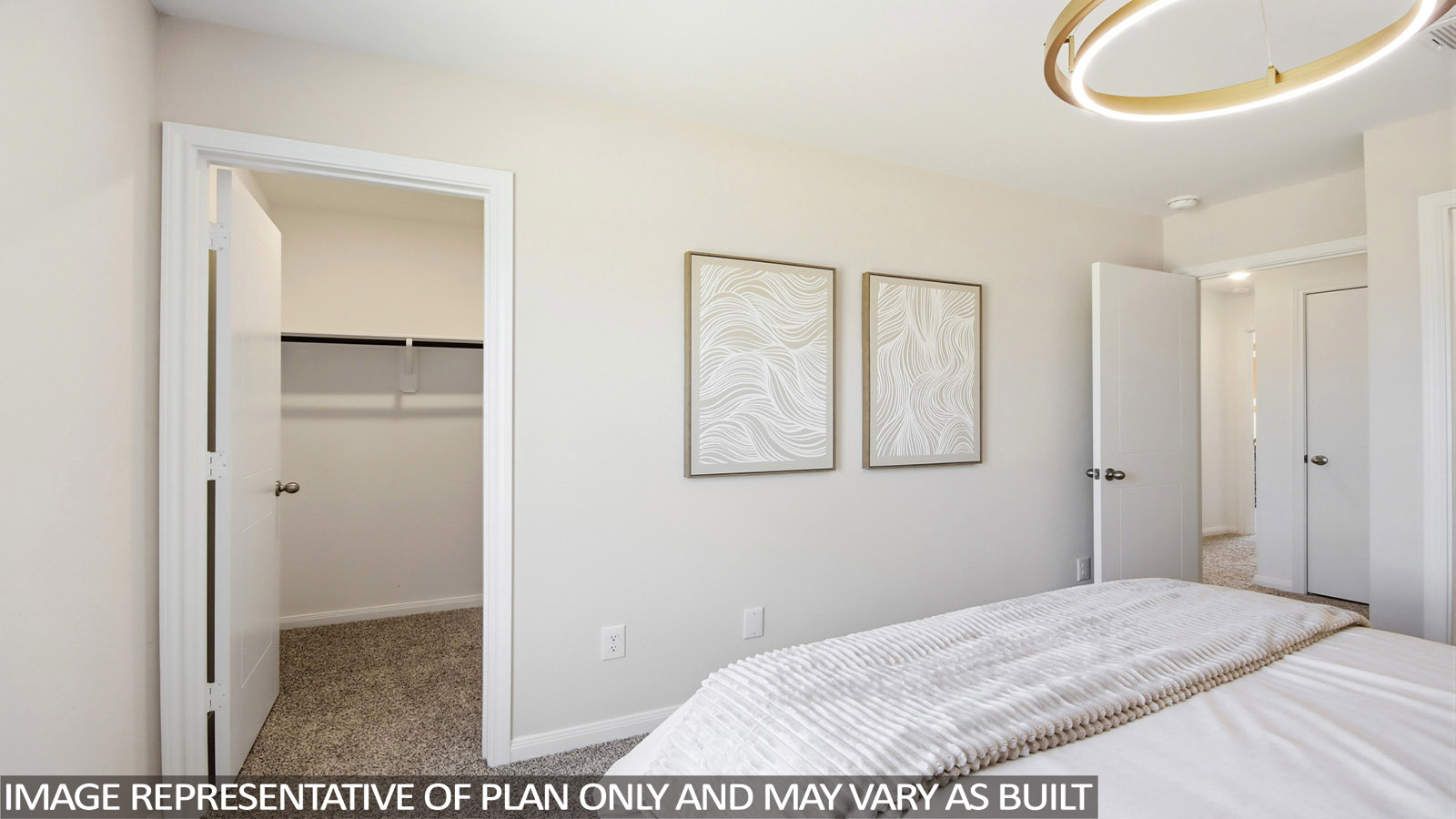 Primary bedroom with carpet flooring