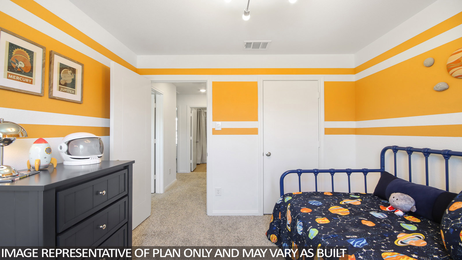 Secondary bedroom with carpet flooring