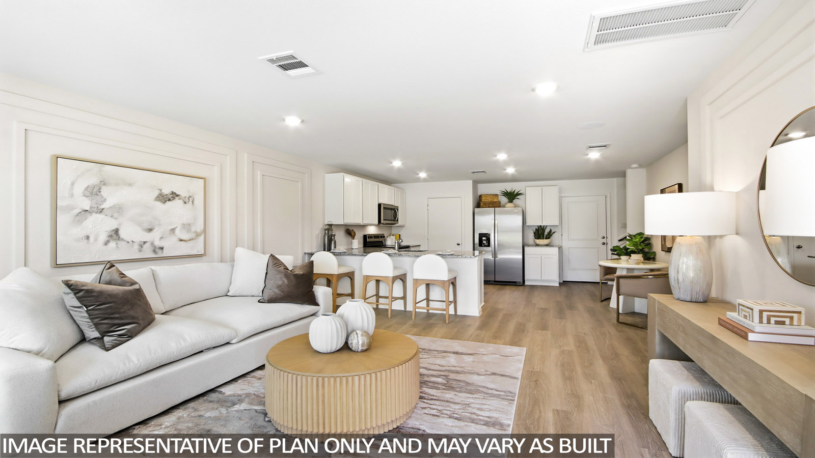 Spacious living area with vinyl flooring