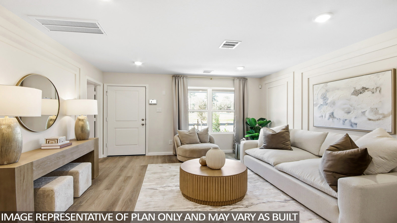 Spacious living area with vinyl flooring