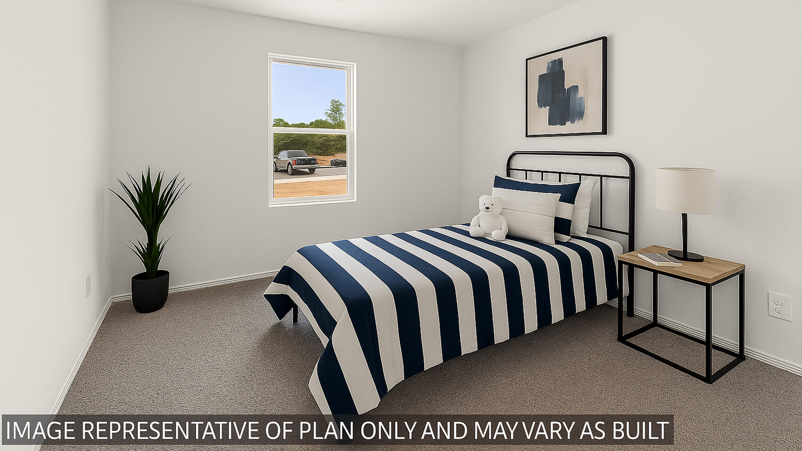 Secondary bedroom with carpet flooring