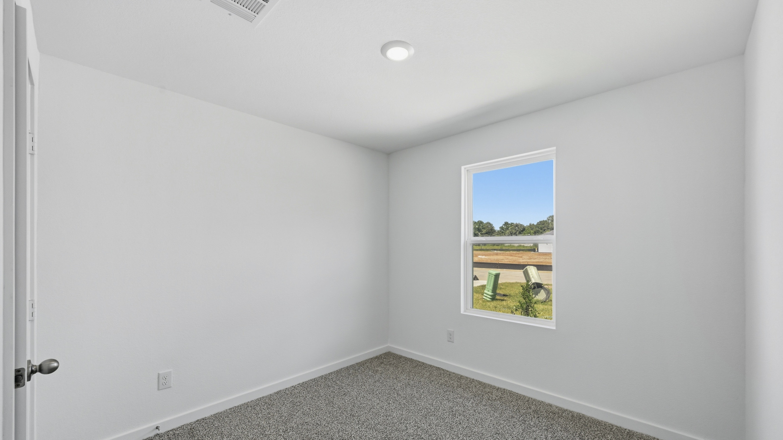 Secondary bedroom with bright window