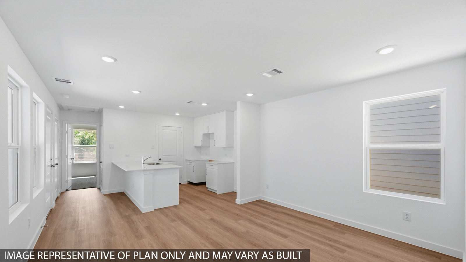 Open concept living, dining, and kitchen area