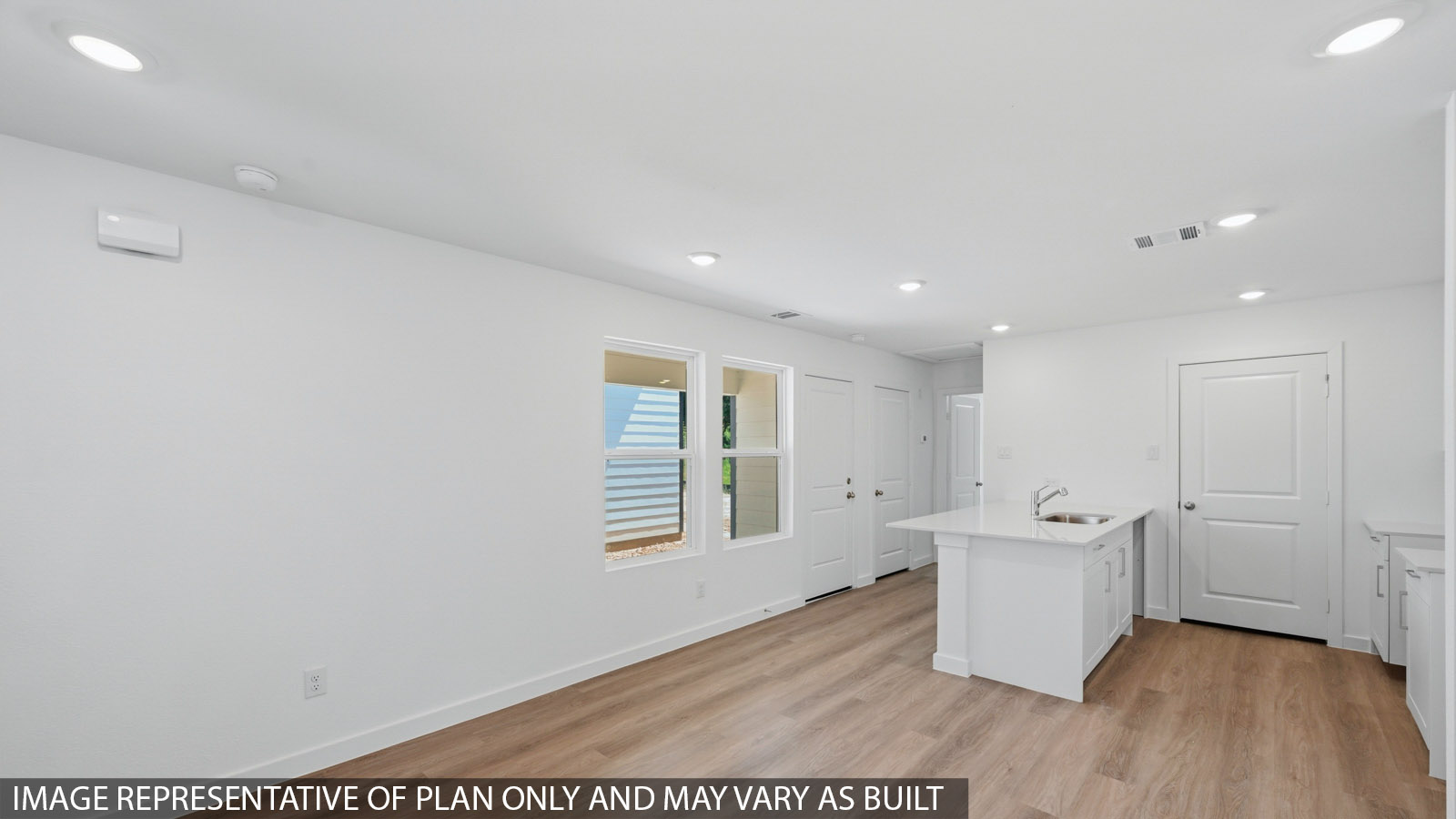 Open concept living, dining, and kitchen area