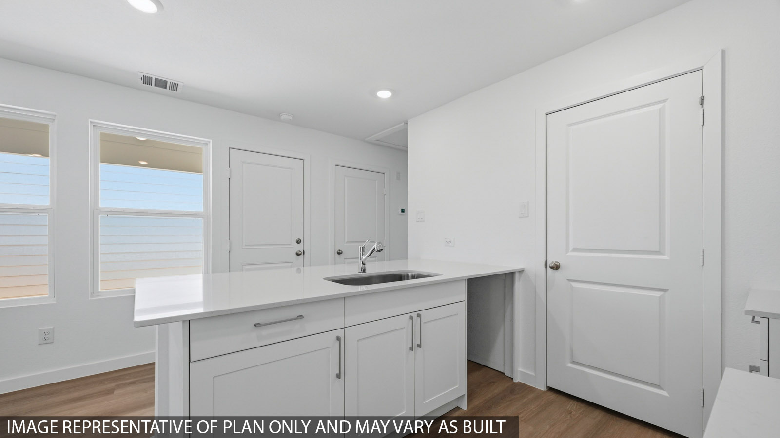 Open concept living, dining, and kitchen area