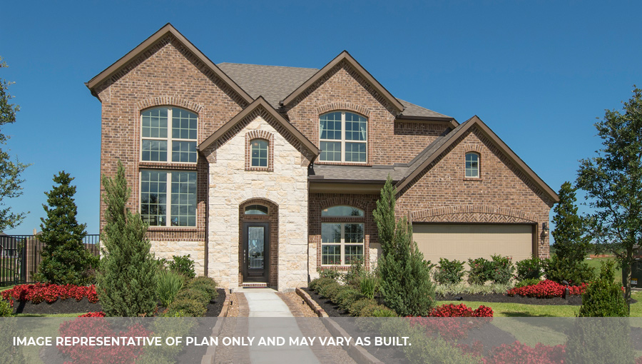 Two-story house with brown and cream details.