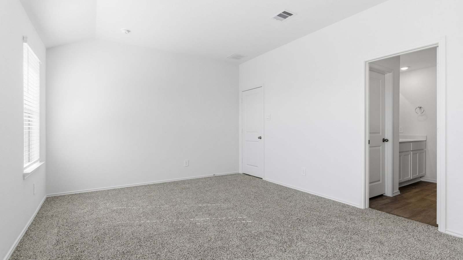 spacious primary bedroom