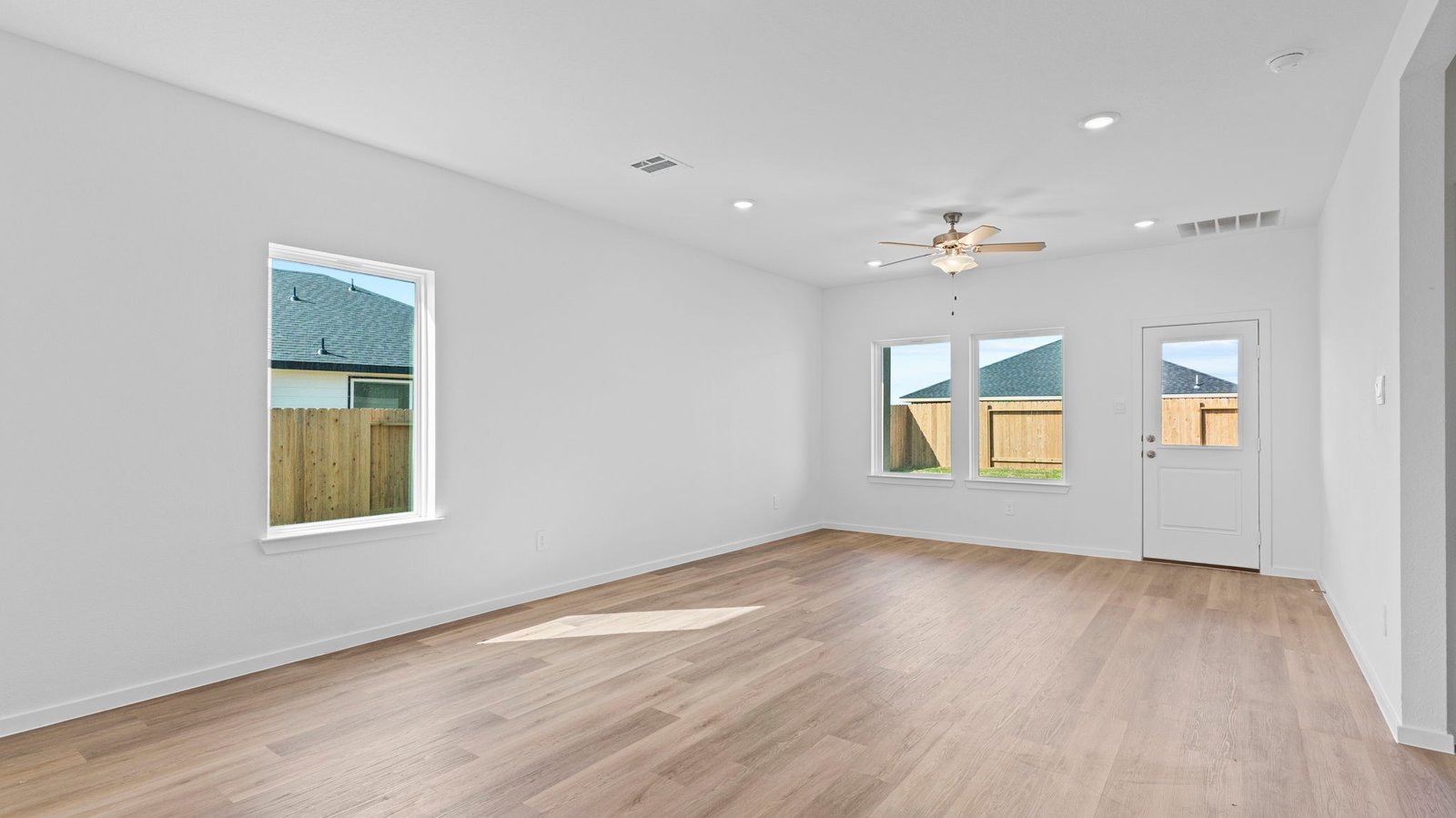 living and dining area next to kitchen