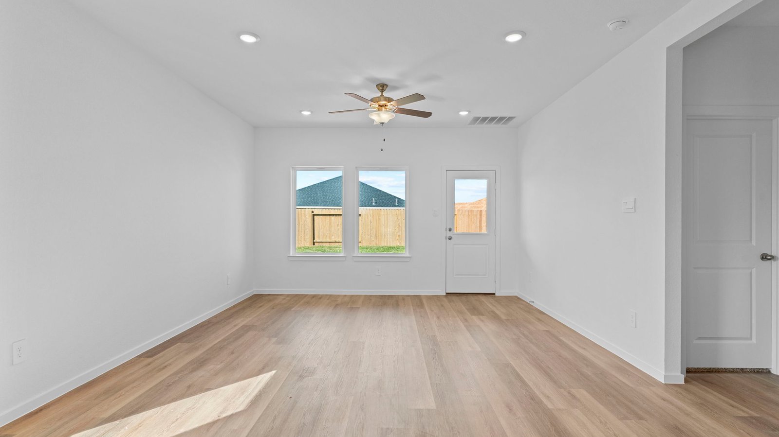 living and dining area next to kitchen