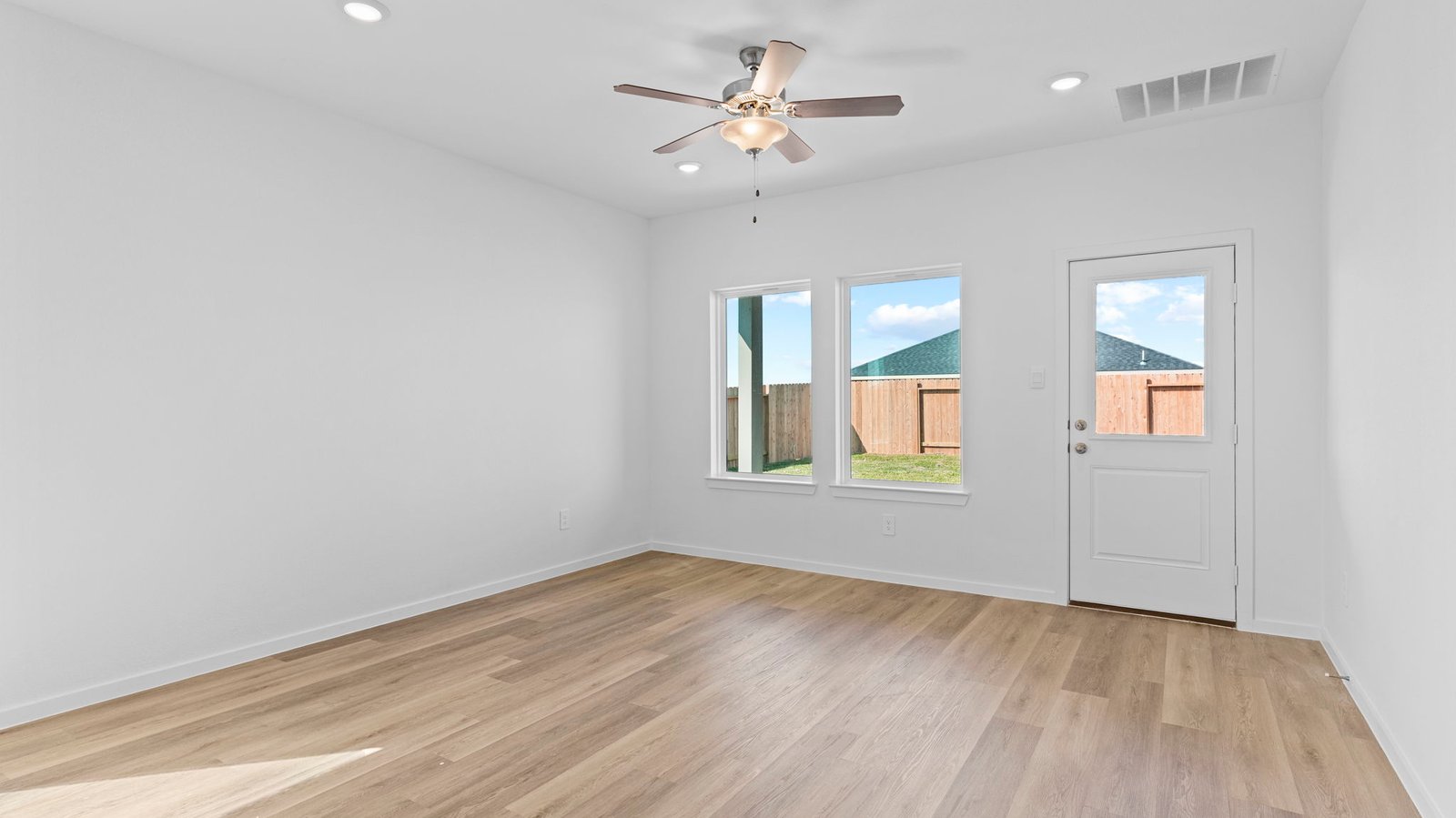 living and dining area next to kitchen