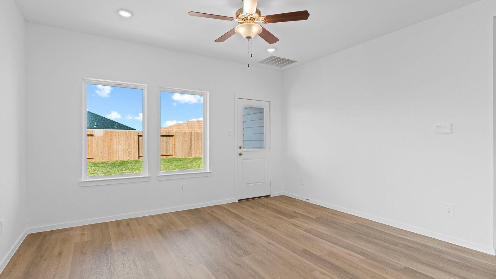 living and dining area next to kitchen