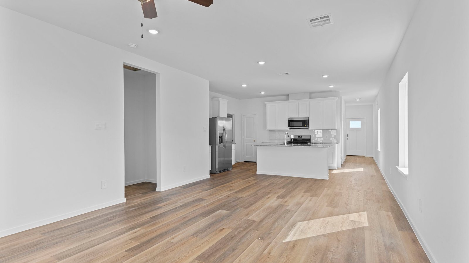living and dining area next to kitchen