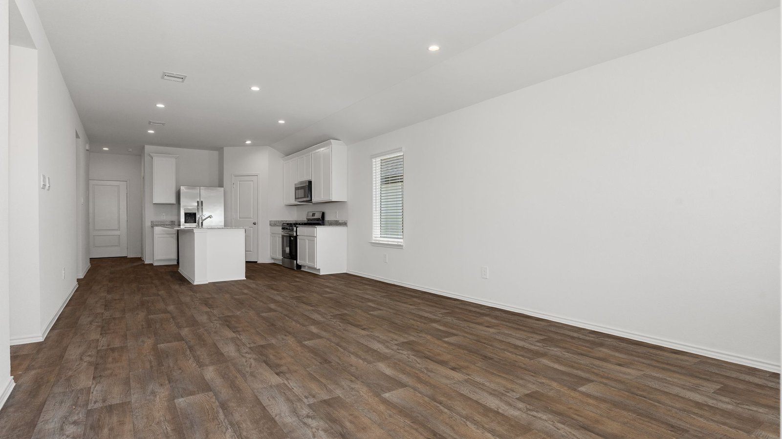 living room overlooking dining room and kitchen