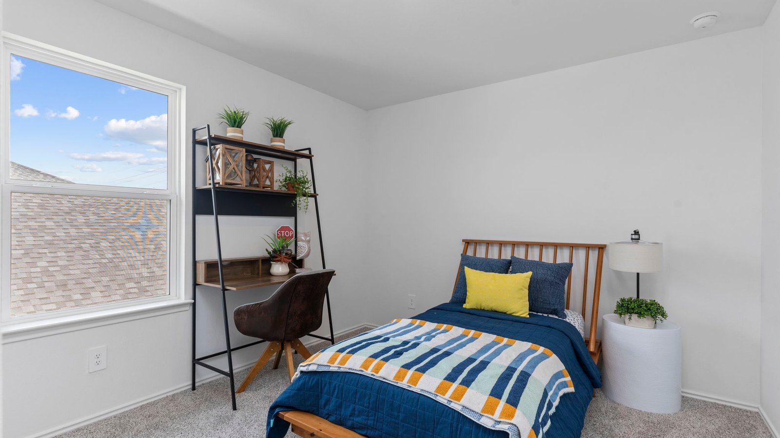 Guest bedroom 3 with plush carpet floors and spacious closet