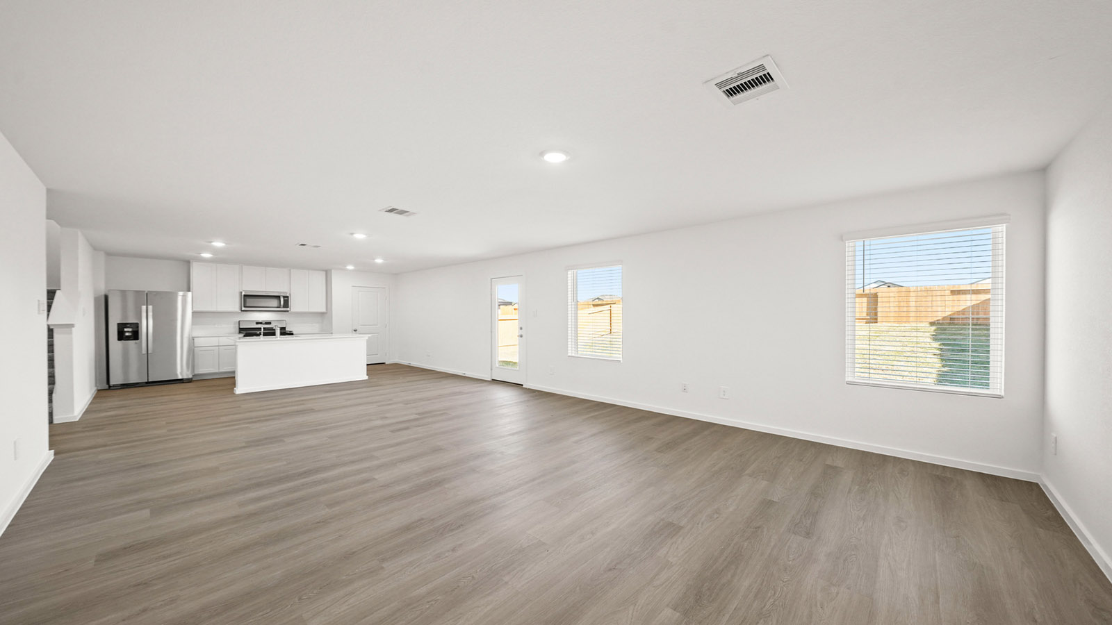 Open concept living, family, dining, and kitchen space