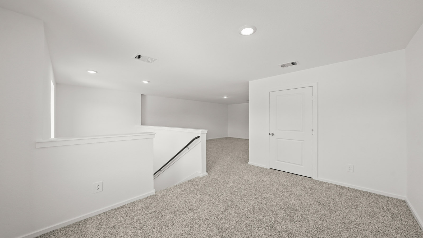 Upstairs landing space perfect for a game room or entertainment spot
