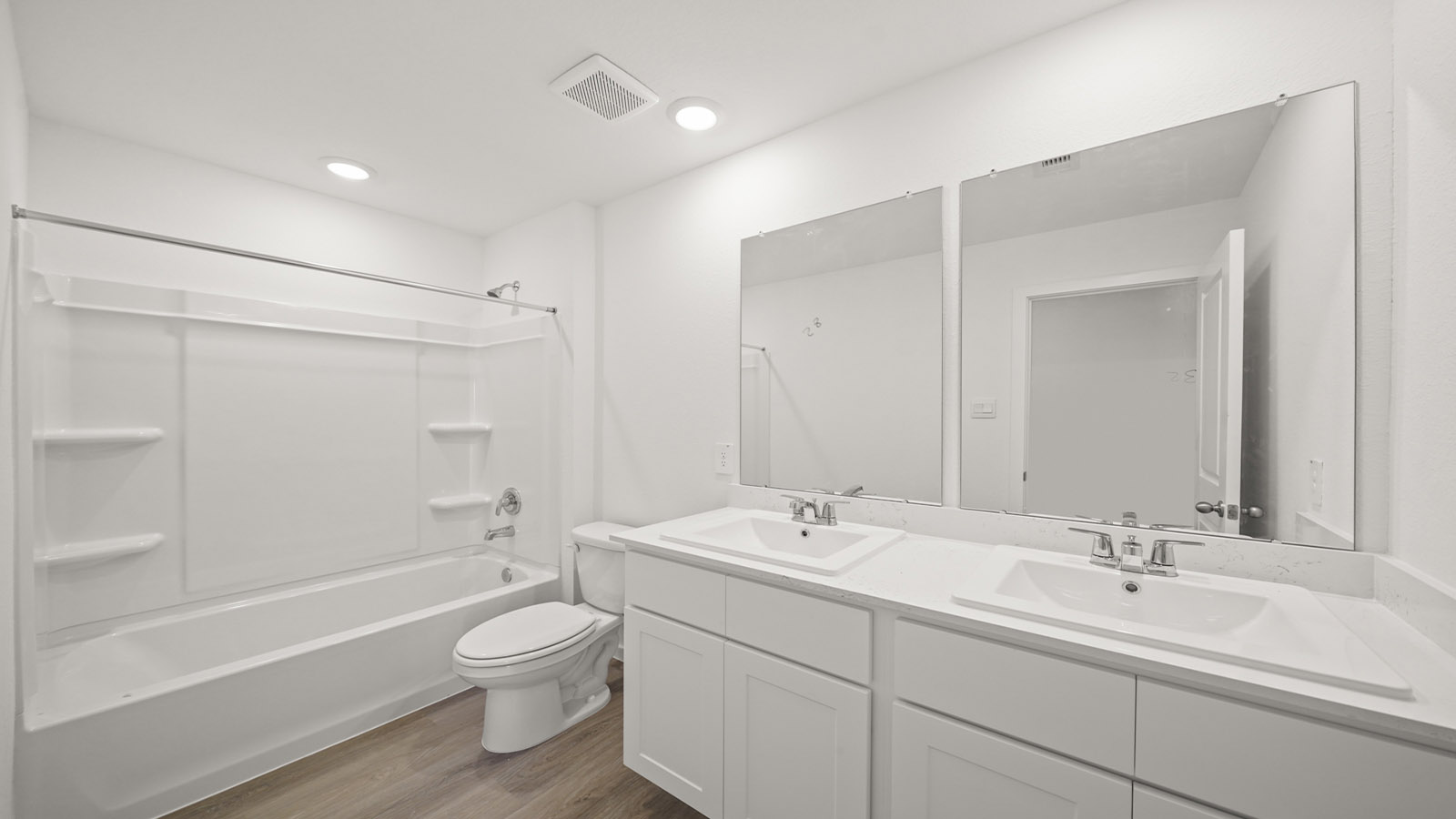 Upstairs guest bathroom with combination shower and bathtub