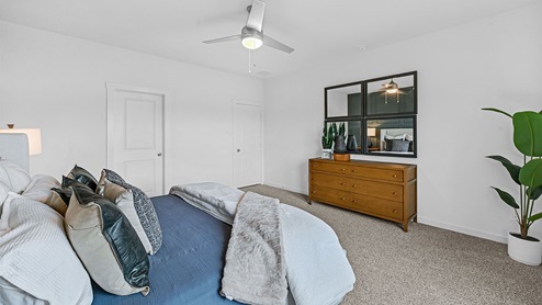 primary bedroom with bathroom