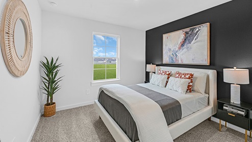 guest bedroom with accent wall