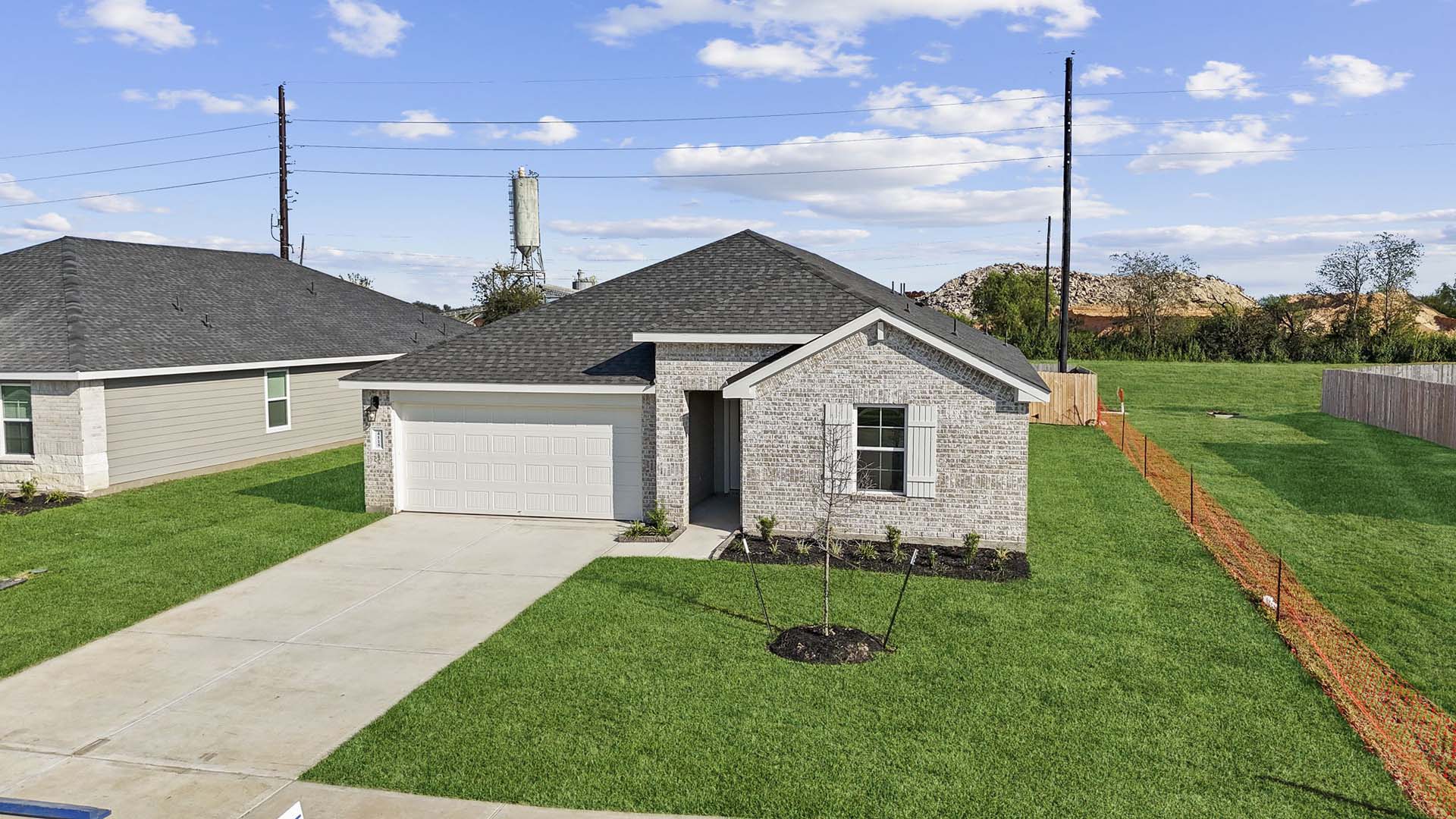 Exterior of single story modern brick style home