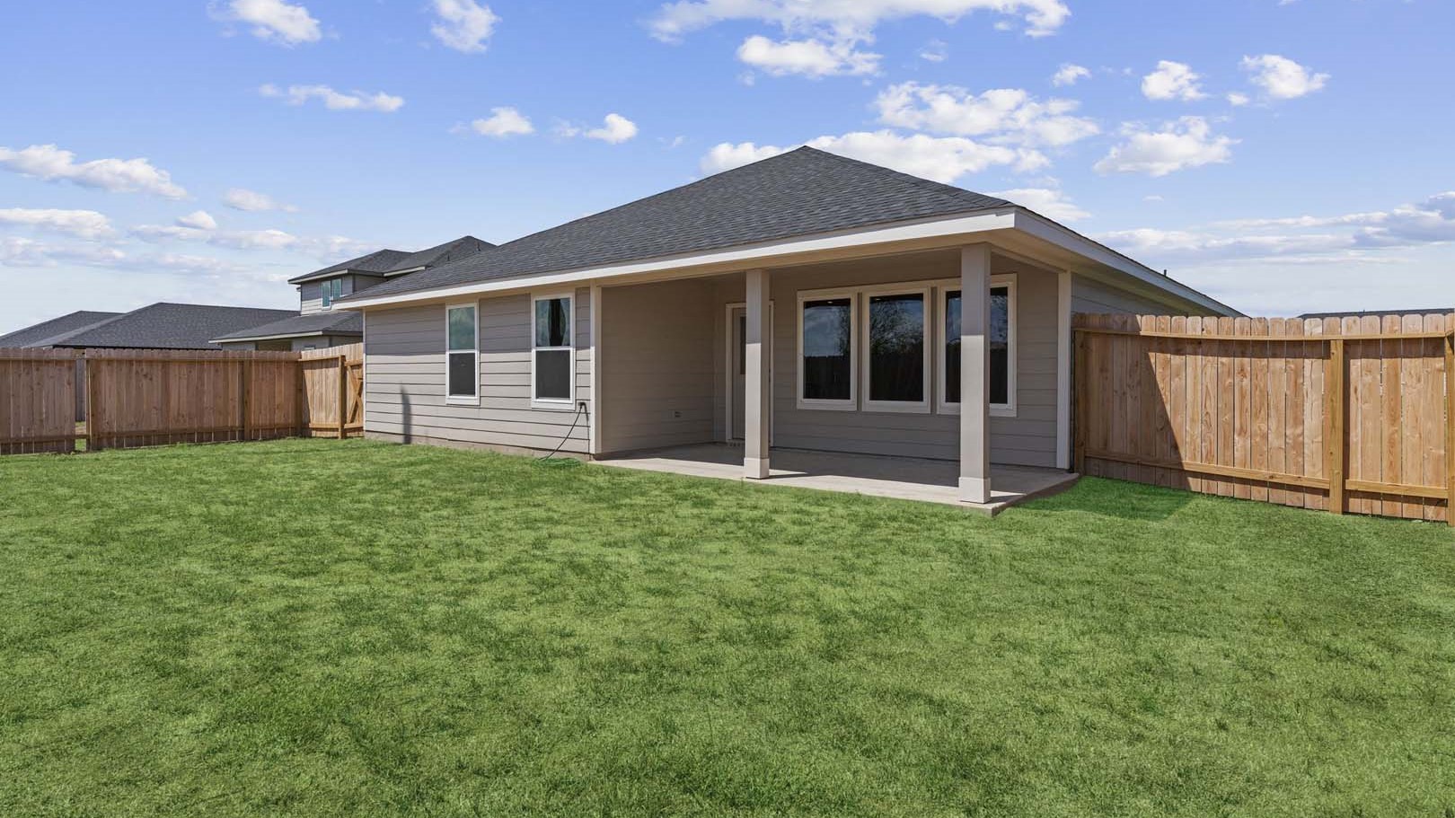 Private spacious fenced-in backyard