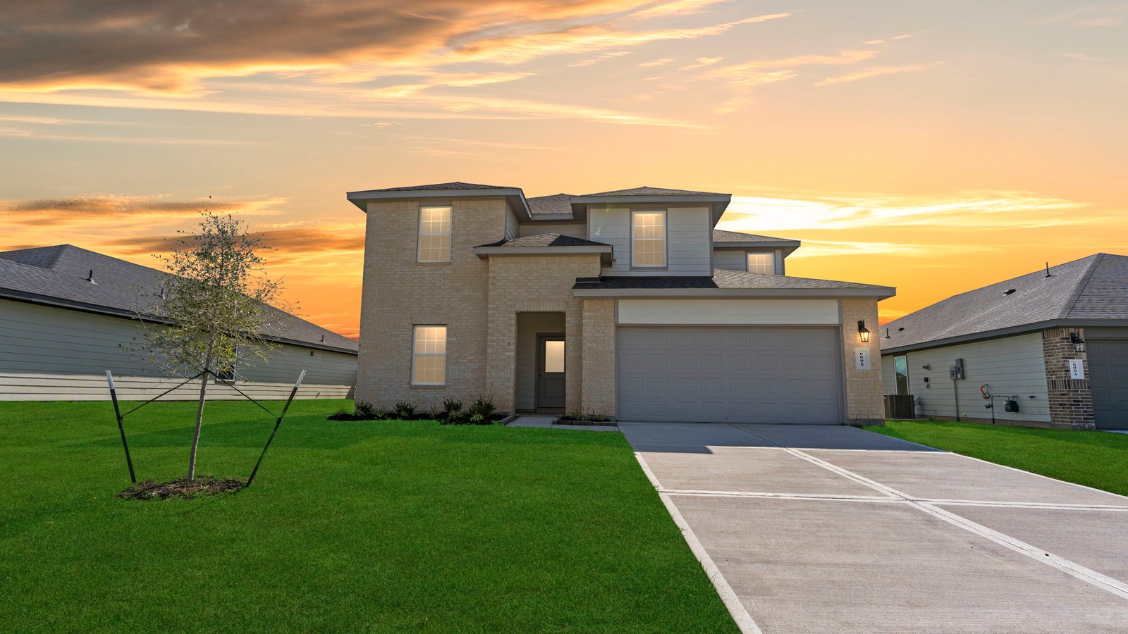 Exterior of two story modern brick home