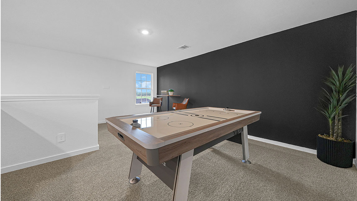 Upstairs landing space with balcony overlooking to downstairs foyer