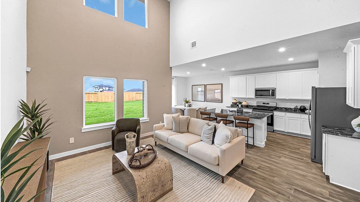 Open living and family room area with ample natural light
