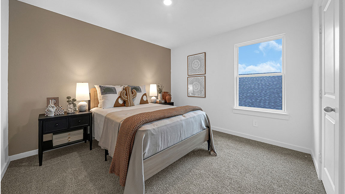 Guest bedroom 3 with plush carpet floors and spacious closet