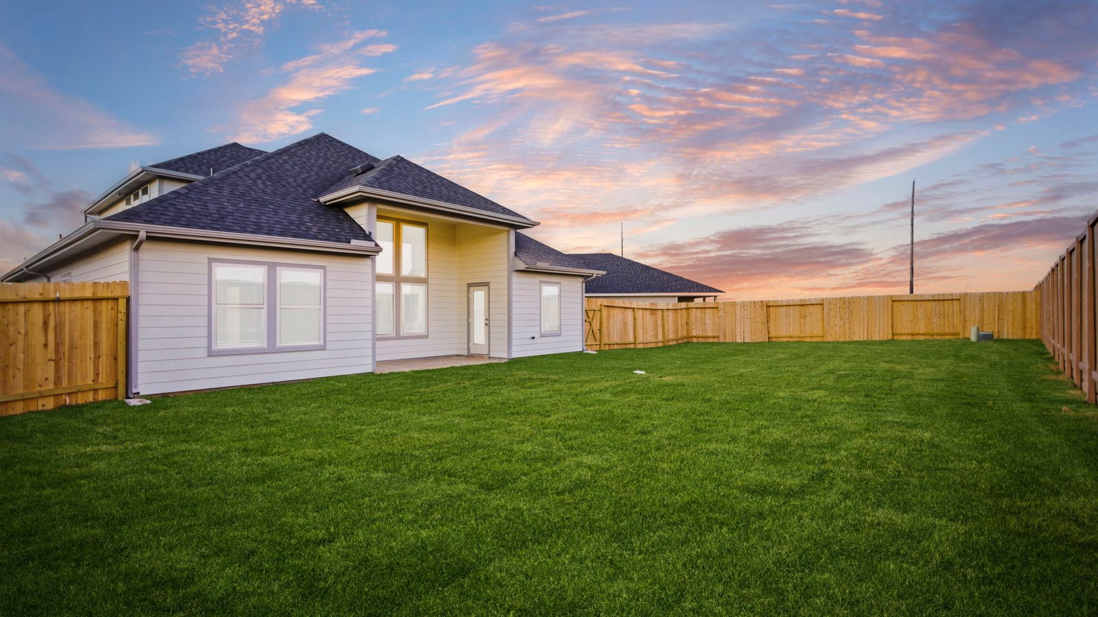 Private spacious fenced-in backyard