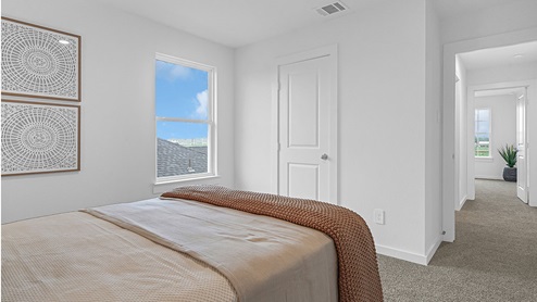 fourth bedroom with window and closet