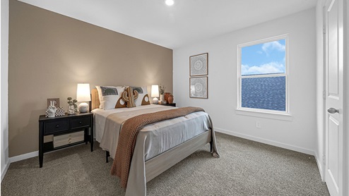 fourth bedroom with window and closet