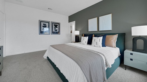 modern minimalistic primary bedroom with windows and high ceiling