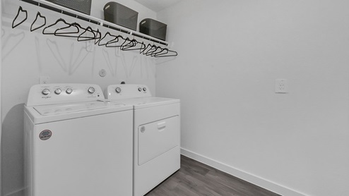laundry area with washer and dryer