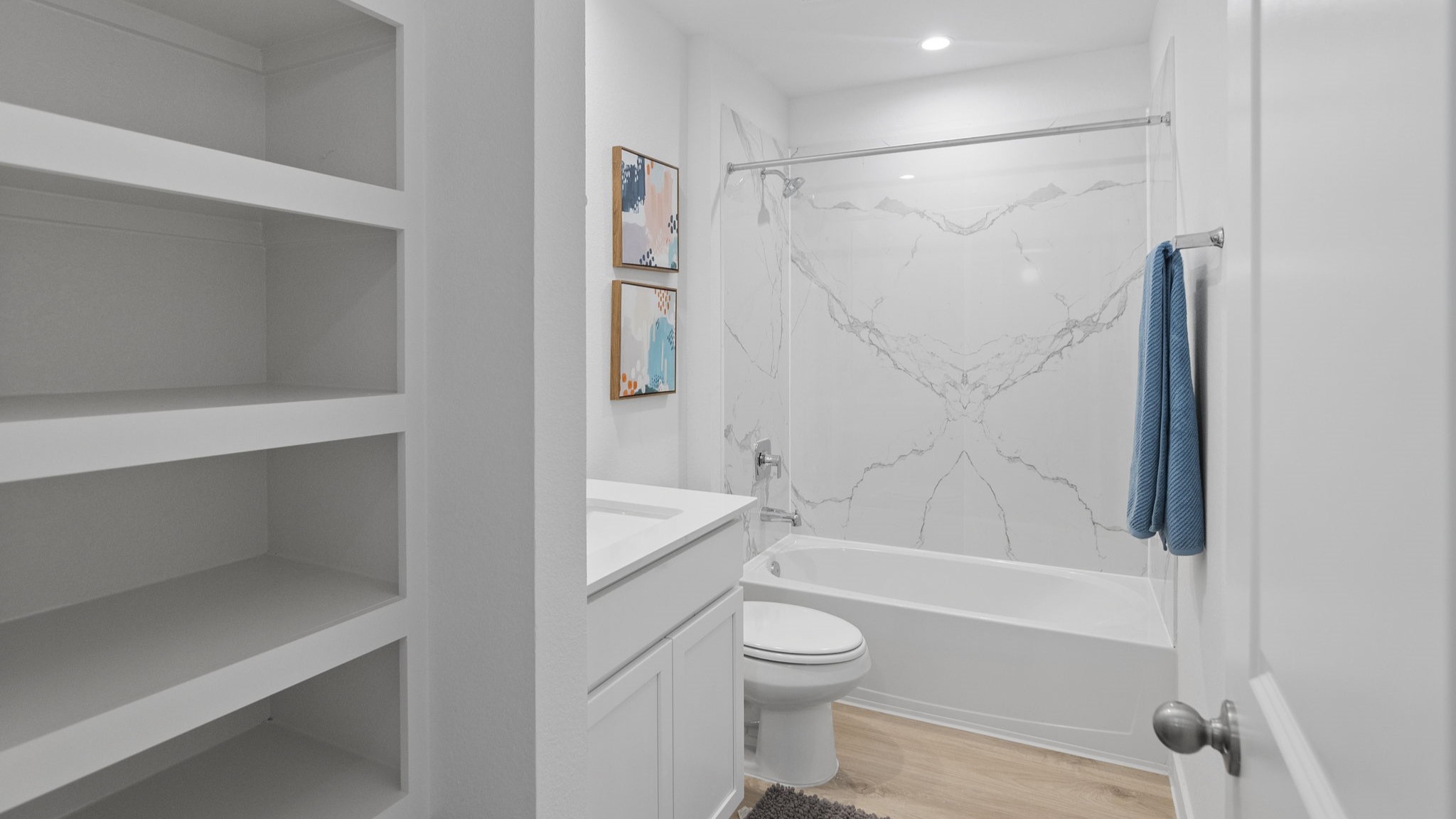 Guest bathroom located between guest bedrooms