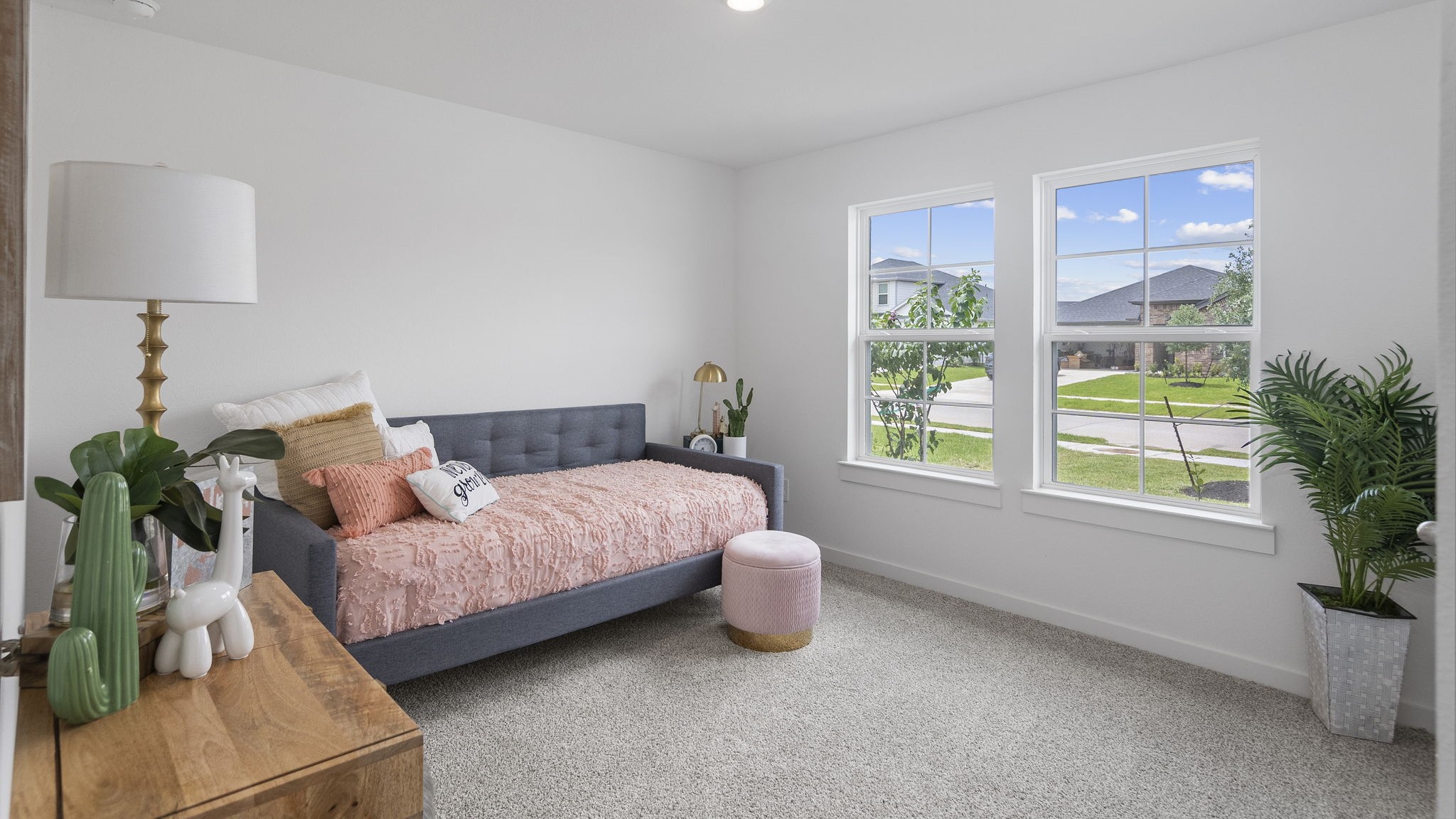 Guest bedroom 3 with plush carpet floors and spacious closet