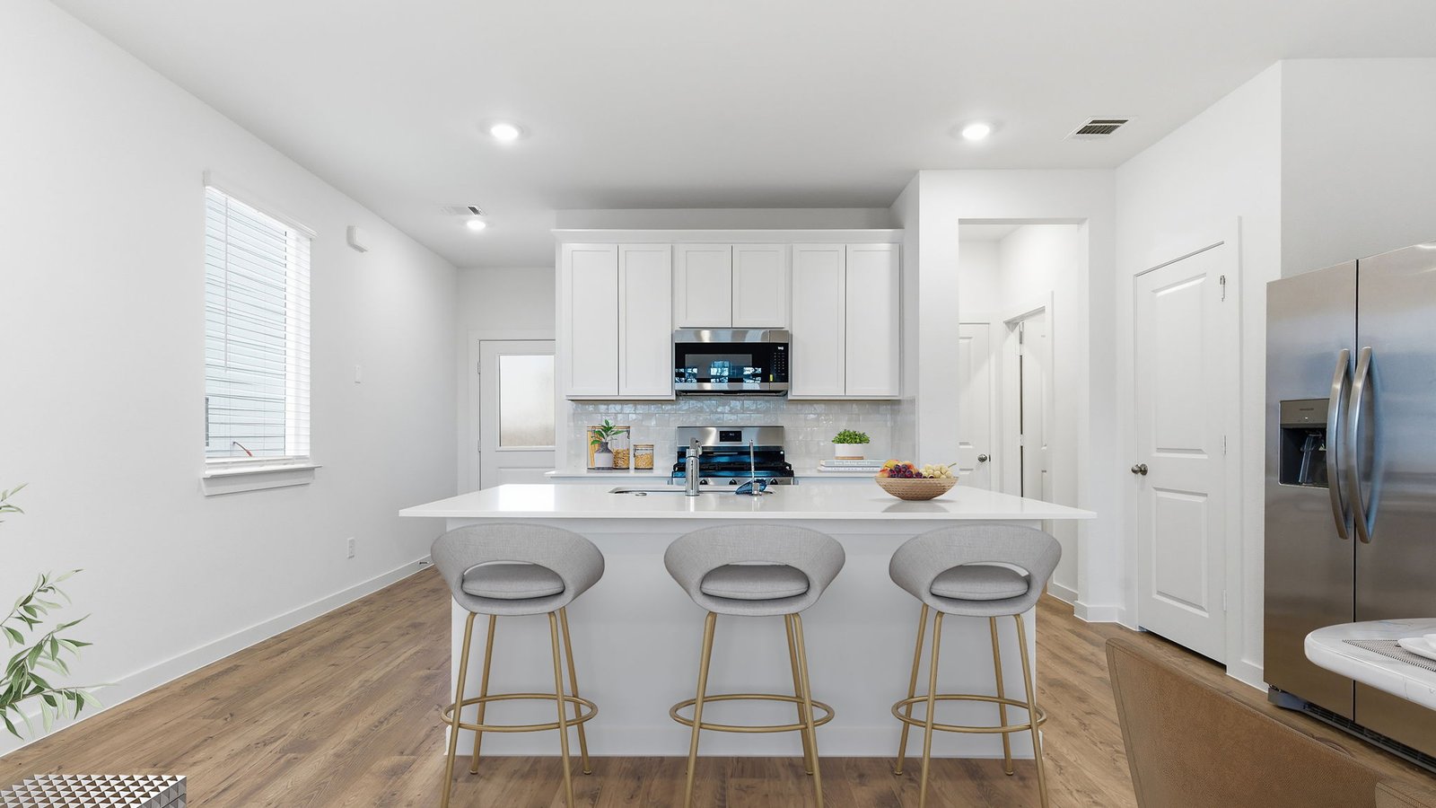 Spacious open concept kitchen with island and counter prep space