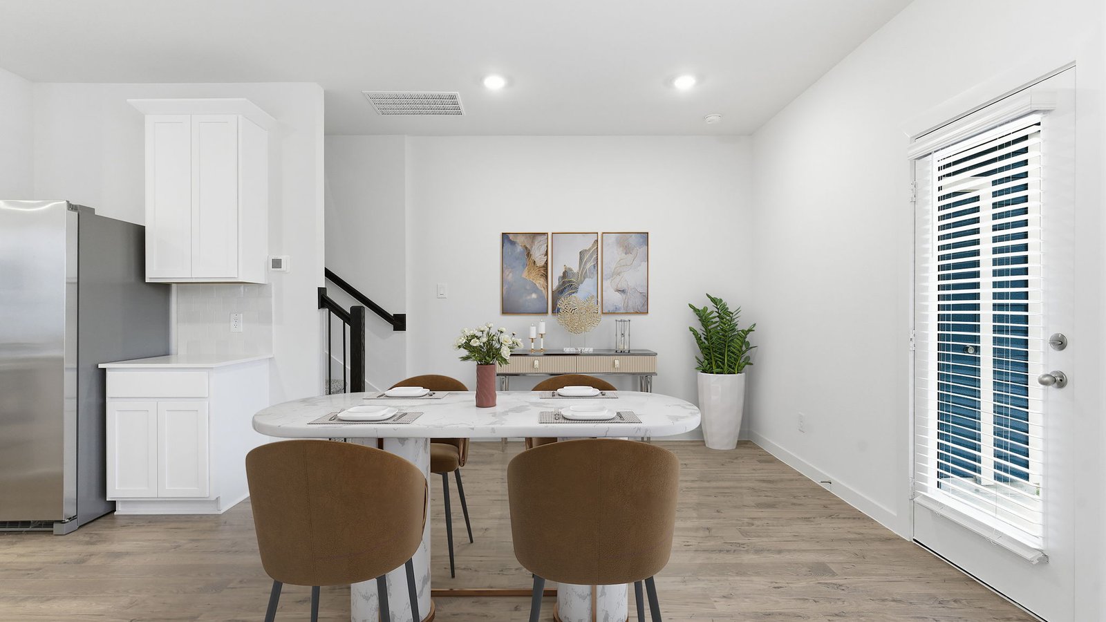 Open dining room space adjacent to kitchen